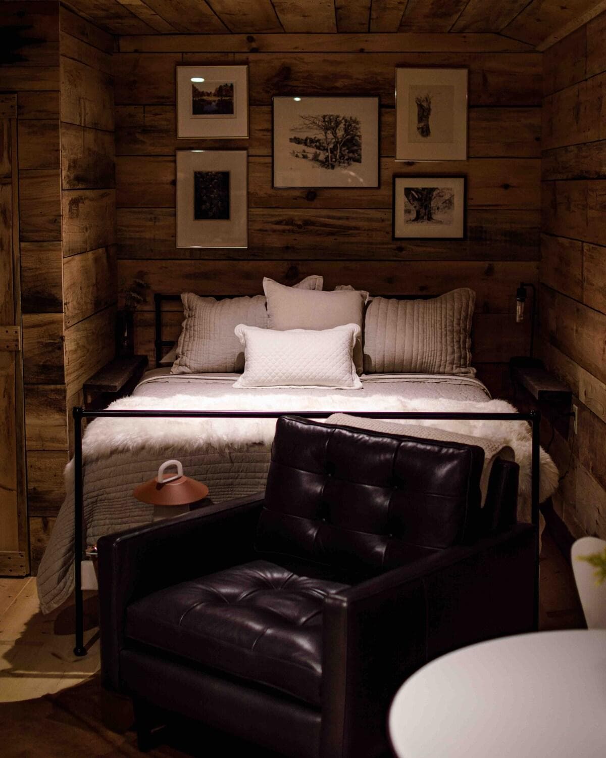 Queen bed with Leesa mattress and bed and leather chair from CB2 